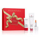 Elizabeth Arden skin care set with a red gift box featuring a gold bow on a white background.