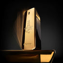 Gold perfume bottle with '1 Million' branding on a dark background