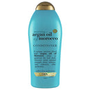 Blue bottle of OGX Argan Oil of Morocco conditioner on a white background