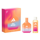 Adidas Moodhack Get Comfy 2 Piece Gift Set, including a bottle of Eau de Parfum and a bottle of Shower Gel, with packaging in vibrant orange and pink hues.
