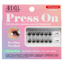 A retail package of Ardell Professional Wispies Volume Press On Pre-Glued Underlash Extensions. The pink packaging features a demonstration graphic of an eye wearing the lashes, and the lash trays inside show two pairs of black synthetic lashes (12mm and 14mm).