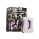 Ariana Grande 'God is a Woman' perfume bottle and packaging with floral design.