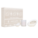 Set of candles with packaging labeled 'mad vanilla' on a white background