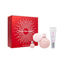 Ariana Grande 'Sweet Like Candy' perfume set with red box, pink perfume bottle, and white tube on a white background.
