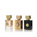 Three perfume bottles labeled 'Club de Nuit' on a white background