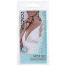 BasiCare Nipple Tape in its clear plastic retail packaging, featuring a model wearing the white tape on her chest.