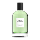 Green perfume bottle with black cap on a white background, featuring 'David Beckham' branding.