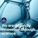 Close-up of a transparent material with bubbles and text 'We are driven by innovation through science' on a blue background.