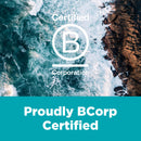 Certified B Corporation logo with ocean and rocks in the background