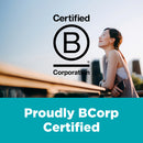 Woman standing outdoors with 'Certified B Corporation' logo and text overlay.