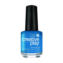 Blue nail polish bottle with black cap on a white background