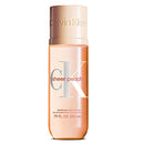 Calvin Klein Sheer Peach hair and body perfume oil in a 7.9 fl oz bottle, featuring a peach-colored translucent body and a beige cap with the Calvin Klein logo.