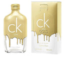 Calvin Klein CK One Gold perfume bottle and packaging on a white background