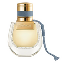 Perfume bottle labeled 'Nomade' with gold cap and clear body on a white background