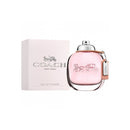 Coach New York perfume bottle and packaging on a white background