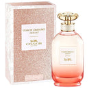 Coach Dreams Sunset perfume bottle and packaging on a white background