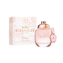 Coach floral perfume bottle and packaging on a white background