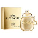 Coach Gold perfume bottle and packaging on a white background