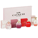 Coach New York perfume set with various bottles and packaging on a white background