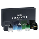Coach New York perfume set with bottles and packaging on a white background