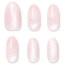 Six almond-shaped nail tips arranged in two rows on a white background, each showing a pale pink glitter finish with different white heart and star nail art designs.