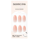 Dashing Diva press-on nails in a pale peach to nude gradient color, packaged in a light pink card with six oval-shaped nails visible through a clear window.