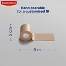 Elastoplast bandage roll with dimensions on a gray background