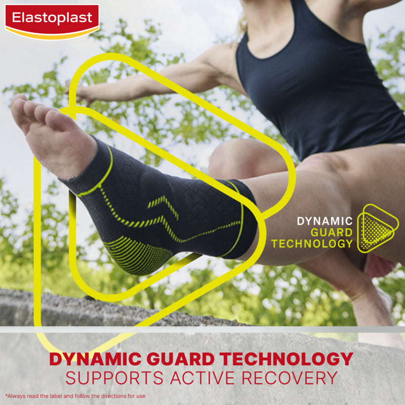 Person wearing an ElastoplastDynamic Guard Technology compression sock outdoors.