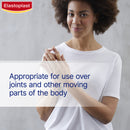 Woman wearing Elastoplast bandage on arm with product branding and text.