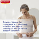 Woman wearing an Elastoplast bandage with text about comfort and adhesion.