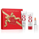 Elizabeth Arden skincare set with red box, two tubes, and a lipstick on a white background