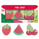 Fruit-shaped bath fizzes in packaging with 'Fruit Crush' branding.