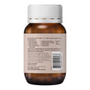 Back view of an amber brown supplement bottle with a white ribbed cap, showing the printed label text and barcode on a white background.