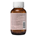 Back view of a brown amber bottle with a white ribbed cap, showing the detailed product information label on a white background.