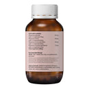 Back view of an amber brown supplement bottle with a white ribbed cap, showing the printed dosage and ingredients label on a plain white background.