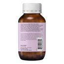 Brown bottle with white cap and purple label on a white background