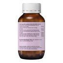 An amber glass supplement bottle with a white ribbed cap, showing the back label with dosage and ingredients information in black text on a light lavender background.