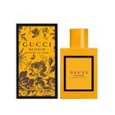 Gucci Bloom perfume bottle and packaging on a white background
