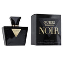Guess Seductive Noir Eau de Toilette bottle and packaging box on a white background. The bottle is glossy black with a gold triangular Guess logo, and the box is black with gold lettering.