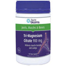 Vitamins bottle labeled 'Tri-Magnesium Citrate 900 mg' by Henry Blooms on a white background