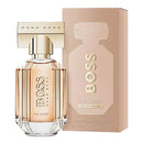 Hugo Boss The Scent perfume bottle and packaging on a white background