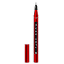 Red brow pen with black cap on a white background