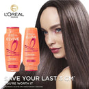 L'Oreal Elvive hair care products with a model and branding on a white background