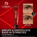 L'Oreal Revitalift eye cream advertisement with before and after effects on a red background