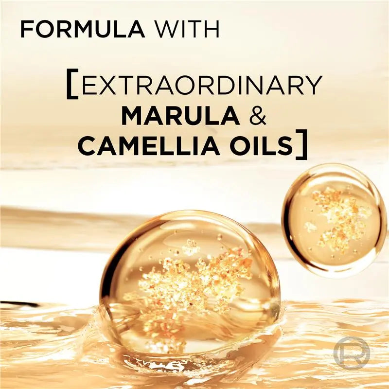 Advertisement for a cosmetic product with marula and camellia oils on a beige background.
