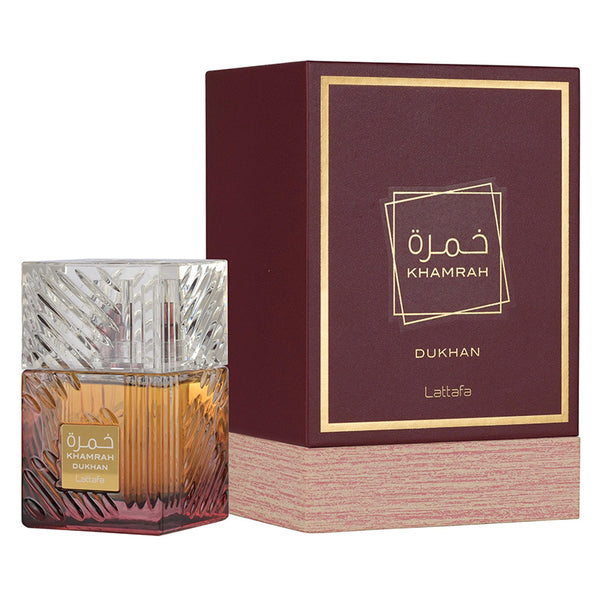 Khamrah Dukhan perfume bottle and packaging on a white background