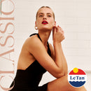 Woman in a black dress with 'Le Tan' logo on a beige background