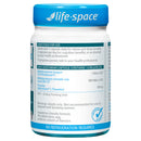 A white bottle of Life-Space Probiotics with a blue cap, showing the directions and usage instructions on the side label.