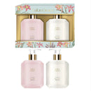 Lulu Grace body lotion set with floral packaging on a white background