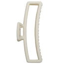 An off-white plastic hair claw clip shown from a side profile view against a solid white background.